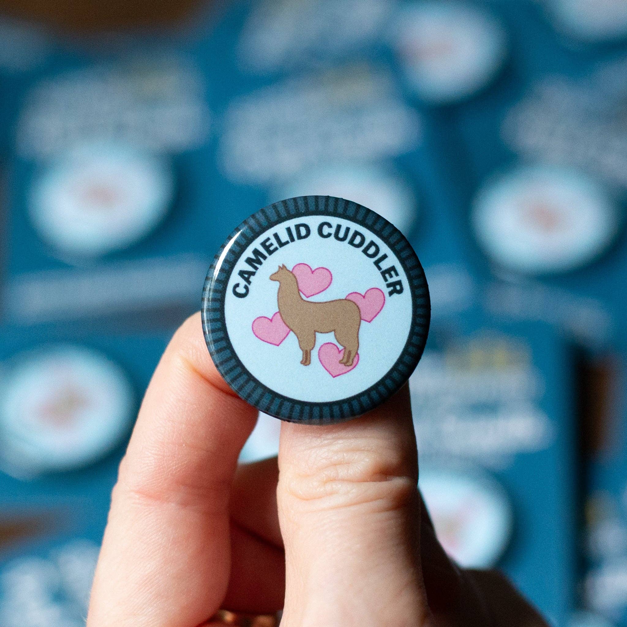 Camelid Cuddler Merit Badge