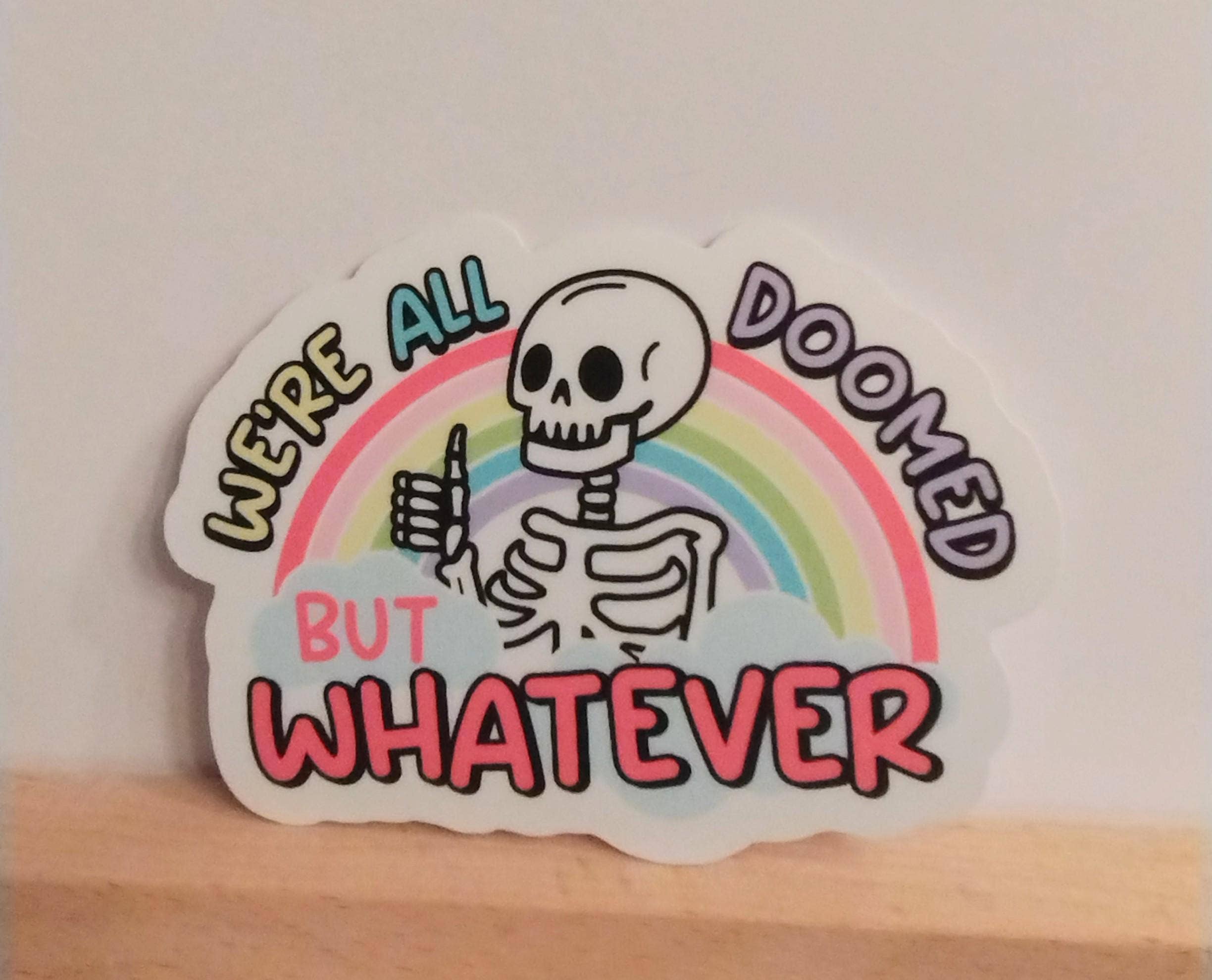 We're All Doomed But Whatever Sticker Rainbow Skeleton